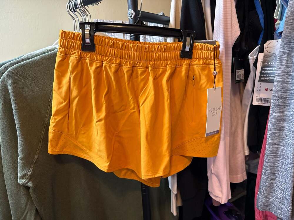 CALIA Women's Mid-Rise Infinity Run Short in Glowing Umber